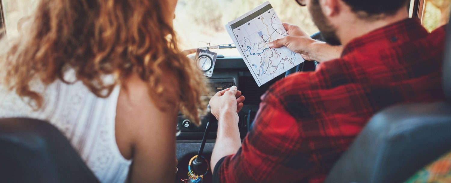 couple reading a map