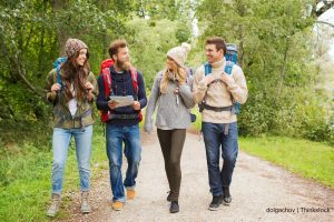 a group of four young adults enjoying hiking in the poconos mountains