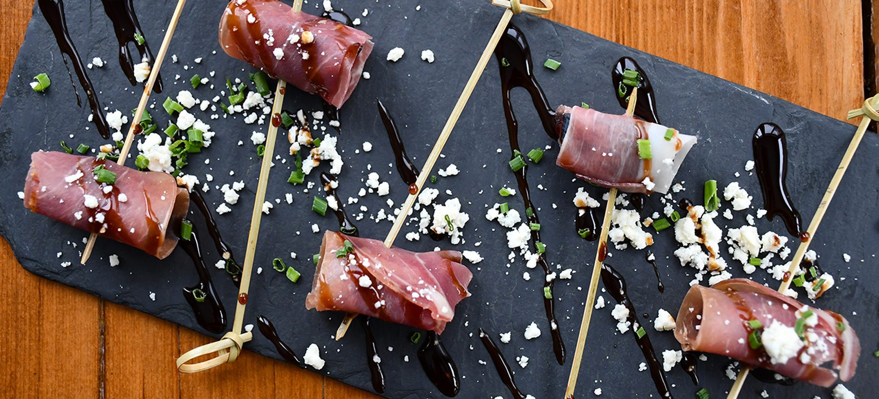 Prosciutto skewers with feta and balsamic vinegar